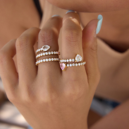 Bagues pour femmes en acier inoxydable doré, étanches, ornées de zircon et d'un luxueux motif goutte d'eau.