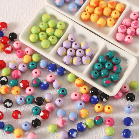 1 sachet de perles acryliques en forme de cœur (20 perles par sachet)