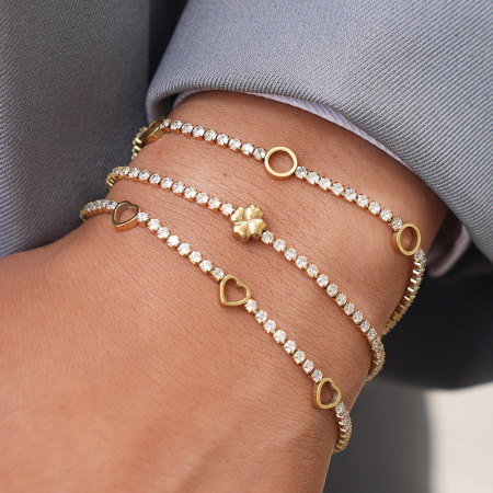 Bracelet chaîne femme en acier inoxydable doré, orné d'un cœur et d'une fleur de luxe.