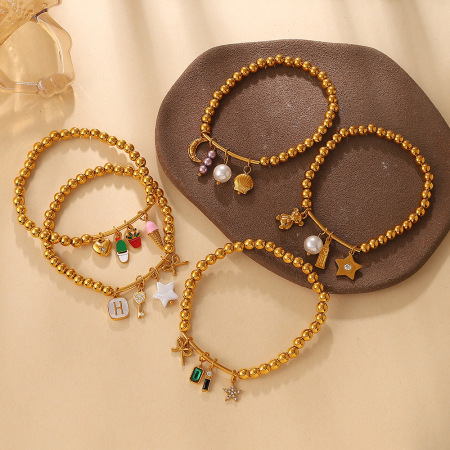 Bracelets pour femmes en acier inoxydable, ornés de perles, motif cœur, étoile et lune, couleur or, avec zircon. 2