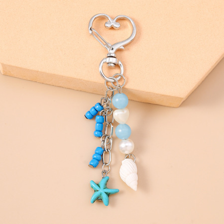 Collection romantique de bijoux de sac style océanique en perles, coquillage et étoile de mer, en alliage 2