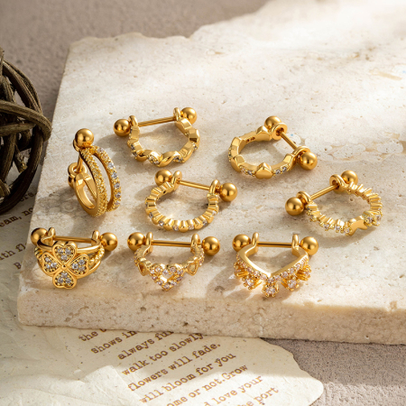 Boucles d'oreilles piercing pour femme, collection Luxe, motif cœur et feuille, couleur cuivre doré et zircon.