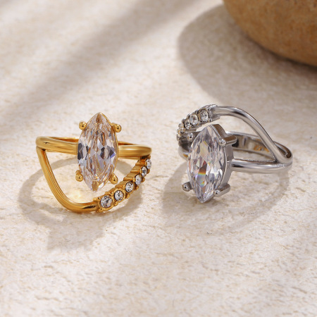 Bagues pour femmes en acier inoxydable doré, imperméables, de forme irrégulière et luxueuse, ornées de zircon et serties de pierres précieuses. Elles sont ornées d'une goutte d'eau et d'un zircon de couleur.