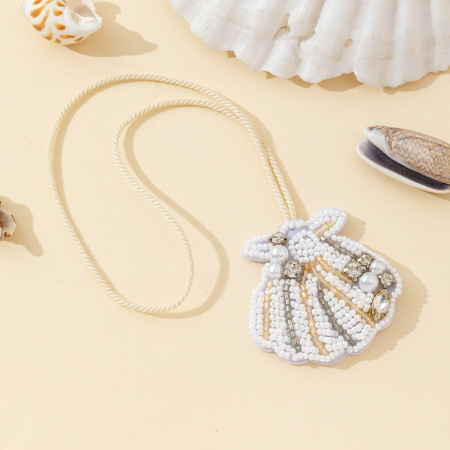 Collection luxueuse de bijoux de sac pour femme, style océanique, perles de coquillage, perles artificielles et strass.