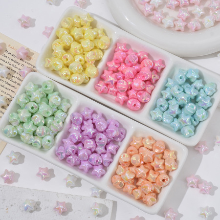 1 sachet de perles acryliques en forme d'étoile (10 perles par sachet)