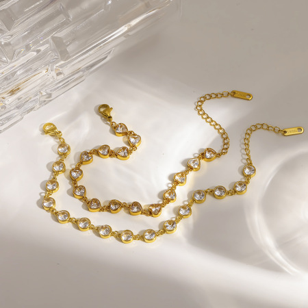 Bracelet chaîne femme luxueux et élégant en acier inoxydable, étanche, couleur or, orné de zircon et d'un cœur. 2