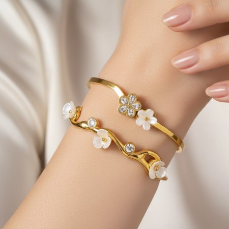 Bracelets pour femmes en acier inoxydable imperméable, couleur or, ornés de strass et de perles artificielles.