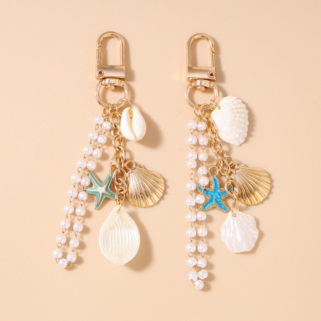 Porte-clés romantique et décontracté style océanique, chaîne en perles, coquillage, étoile de mer et métal.