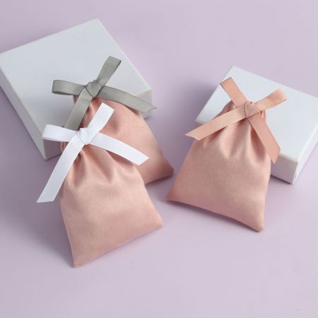 Pochettes à bijoux en tissu uni à nœud papillon quotidien de la série Simple