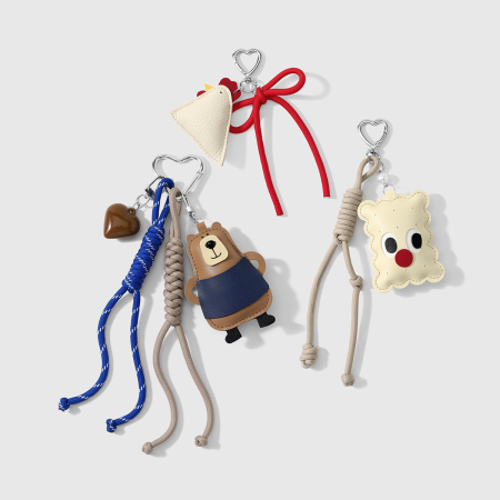 Breloques de sac en cuir torsadées, motif animal mignon, série simple