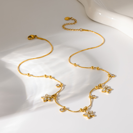 Colliers pendentifs élégants pour femmes, en acier inoxydable, étanches, couleur or, avec zircon et motif floral.