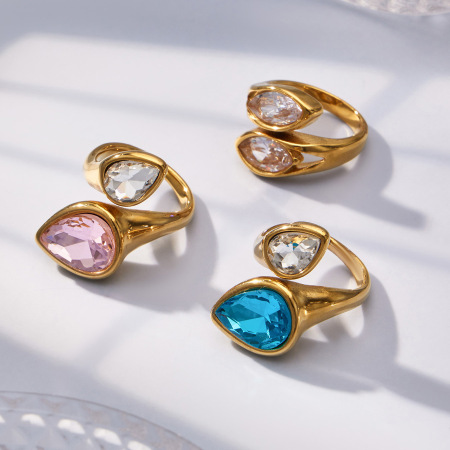 Bagues pour femmes en acier inoxydable doré, imperméables, ornées de zircon et de verre, au design luxueux et épuré, ornées d'une goutte d'eau. 2