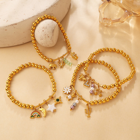 Bracelets à breloques simples pour femmes, en acier inoxydable, couleur or, avec motif floral, cœur, animal et étoile. 2