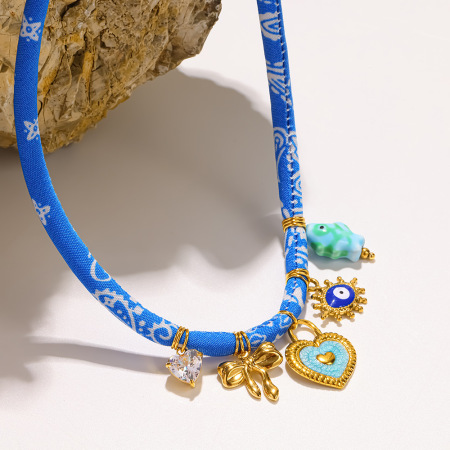 Collier pendentif bohème œil de diable, nœud papillon, poisson, acier inoxydable, couleur or, zircon, pour femme
