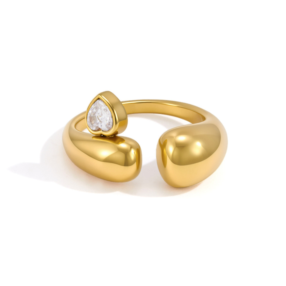 Bague Pour Femme En Acier Inoxydable Doré, Imperméable, Sertie D'Un Zircon Et Ornée D'Un Cœur De Forme Irrégulière, Élégante Et Luxueuse. Elle Est Ornée D'Une Pierre Précieuse. Image5