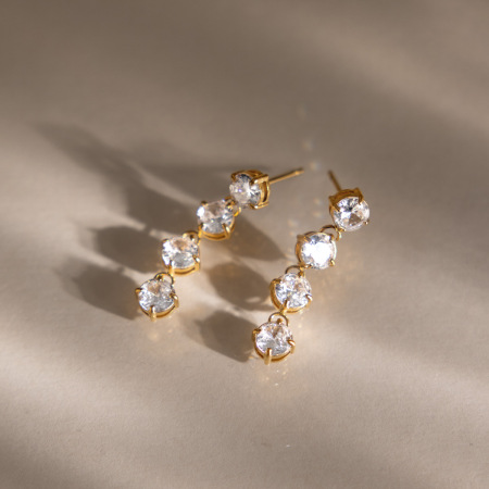 Boucles d'oreilles pendantes pour femme, style luxueux, avec pompon simple et rond, en acier inoxydable étanche couleur or et zircon.