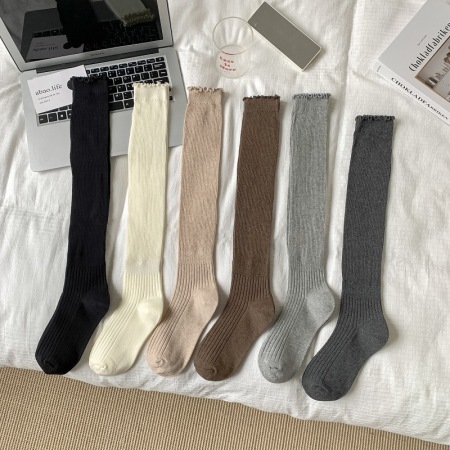 Chaussettes hautes unies élégantes à léger rebond