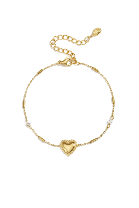 Bracelet orné de perles, de pierres et d'un cœur imposant