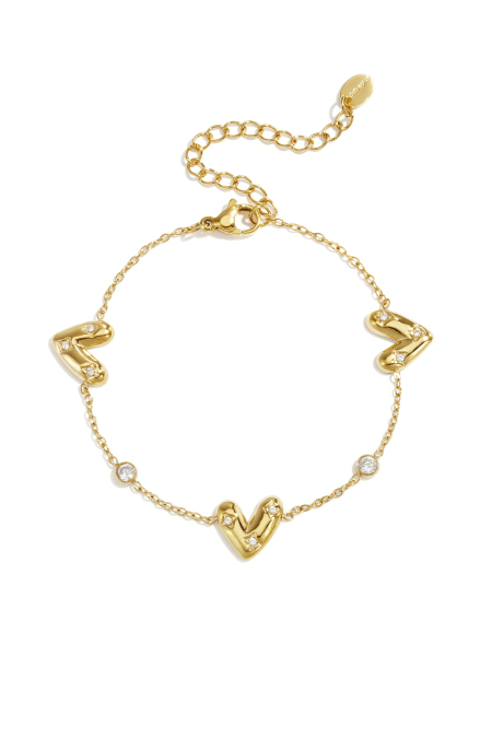 Bracelet orné de trois cœurs sertis de pierres rondes en oxyde de zirconium.