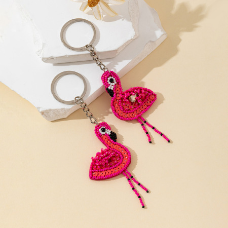 Porte-clés en alliage avec perles et motif flamants roses naturels (Série Simple).