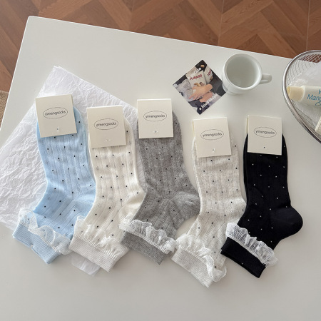 Chaussettes mi-mollet élégantes à pois, couleur unie, légèrement rebondissantes