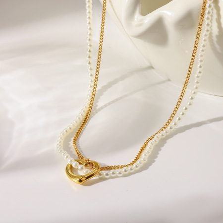 Collier pendentif élégant en forme de cœur, en acier inoxydable étanche, couleur or, avec perle artificielle. 2