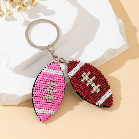 Porte-clés en alliage, strass et perles de sport tissées en forme d'ellipse, de couleurs assorties, de la série Simple Sports.