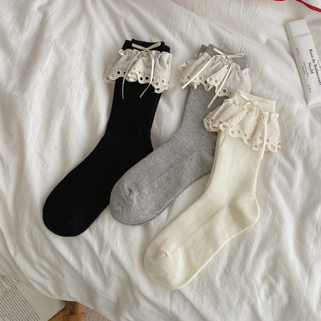 Chaussettes mi-mollet élégantes, légèrement rebondissantes et de couleur unie