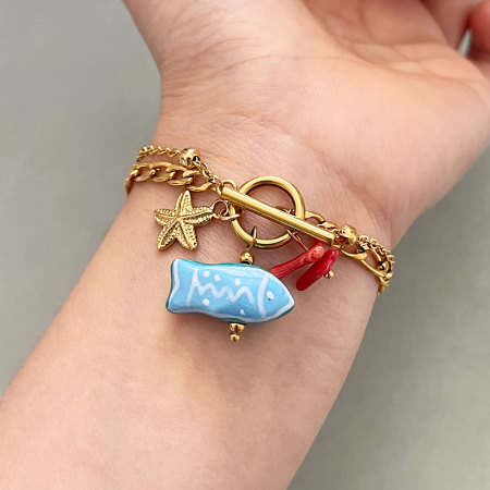Bracelets à breloques pour femmes, style océanique, en céramique, avec poissons et étoiles de mer, en acier inoxydable étanche, couleur or.