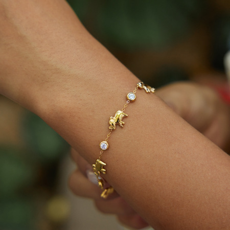 Bracelet chaîne femme luxueux et élégant en acier inoxydable imperméable couleur or avec motif patchwork animalier et zircon.