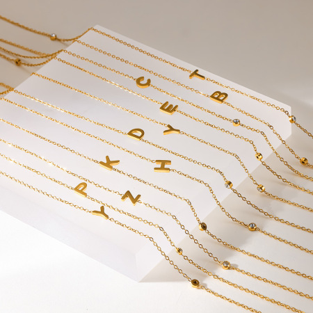 Colliers à maillons pour femmes, collection Simple, avec pendentif lettre et pompon quotidien, en acier inoxydable, couleur or, avec zircon.