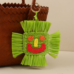 Collection Ethnique Vacances Fleur Soleil Style Océanique Pompon Visage Souriant Fraise Étoile De Mer Tissée Breloques De Sac En Raphia h5 Image4