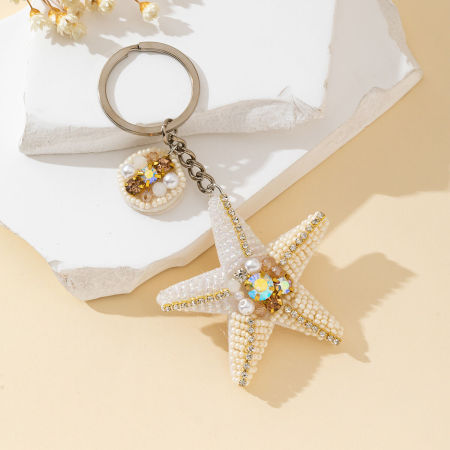 Porte-clés simple en alliage, perles naturelles style océanique, étoiles de mer tissées, perles tressées, série simple, en forme d'étoile de mer.