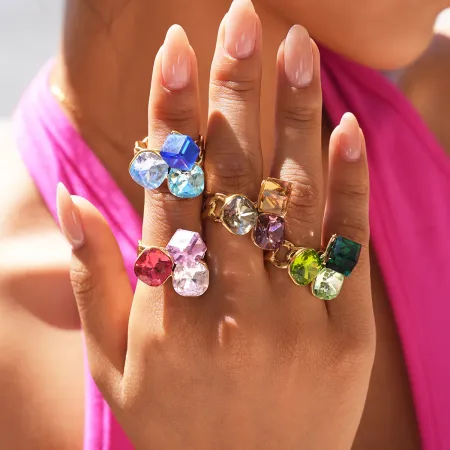 Bague de luxe en acier inoxydable de forme irrégulière, étanche, couleur or, ornée d'un cristal et d'une pierre précieuse.