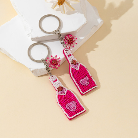 Porte-clés simple et décontracté en alliage de couleurs assorties, perles en forme de cœur et de bouteille de vin.