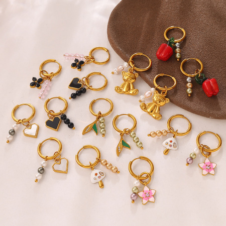 Boucles d'oreilles pendantes pour femme, en acier inoxydable doré, ornées de strass et en forme de cœur et de fleur.