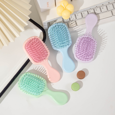 Peignes portables à coussin d'air de petite taille