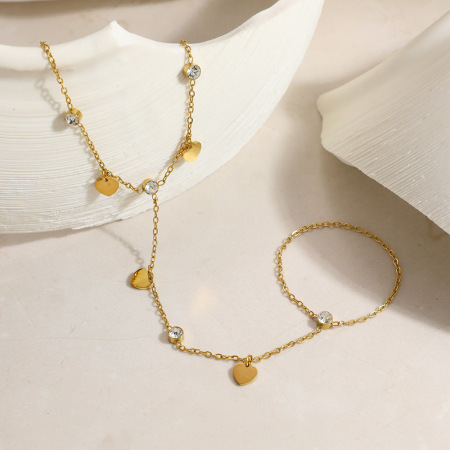 Chaîne de main pour femme en acier inoxydable doré avec strass en forme de cœur