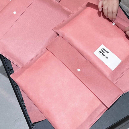 Sac d'emballage simple en tissu non tissé épais pour vêtements et accessoires