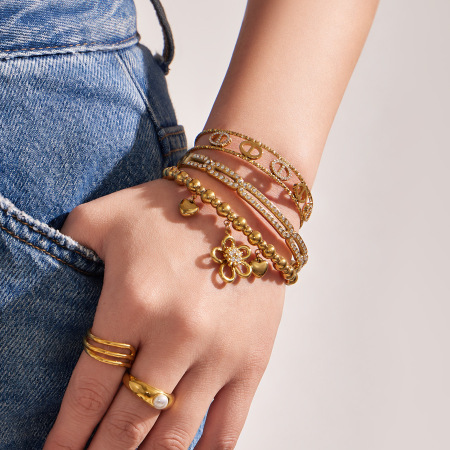 Bracelet manchette pour femme en acier inoxydable doré, étanche, avec zircon et motif floral géométrique. 2