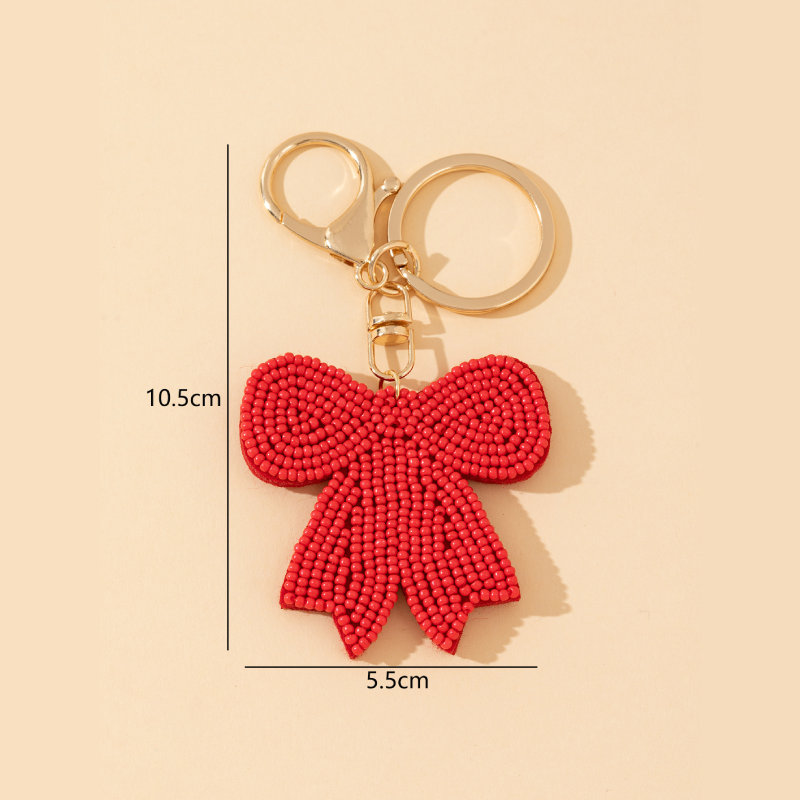 Porte-Clés Romantique En Alliage Tissé Avec Perles Et Nœud Papillon, Orné D'Un Nœud Papillon Doux Et Coloré.
