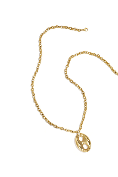 Collier imposant avec un pendentif en forme de nœud
