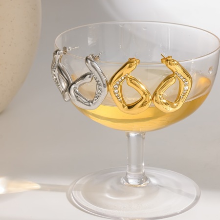 Boucles d'oreilles puces pour femmes en acier inoxydable étanche, couleur or, en forme de G, ornées de strass.