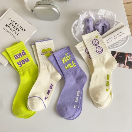 Chaussettes mi-mollet unisexes à léger rebond, décontractées, unies, à lettres contrastées.