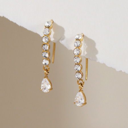 Boucles d'oreilles pendantes pour femme, élégantes et raffinées, en acier inoxydable doré, ornées de zirconiums et d'un motif goutte d'eau. Collection Luxueuse.