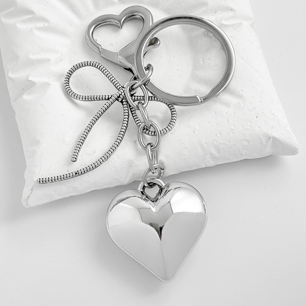 Porte-Clés Romantique En Alliage, Orné D'Un Nœud Papillon Et D'Une Perle Artificielle, En Forme De Cœur Simple Et Uni. Collection Romantique. h5Image2