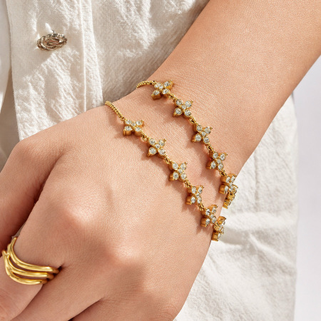 Bracelet à maillons pour femme en acier inoxydable, imperméable, couleur or, orné de strass et d'une simple fleur 2