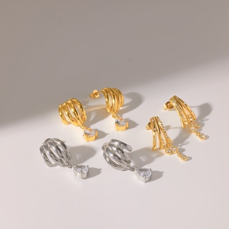 Boucles d'oreilles pendantes élégantes pour femme, en acier inoxydable doré, de forme géométrique.