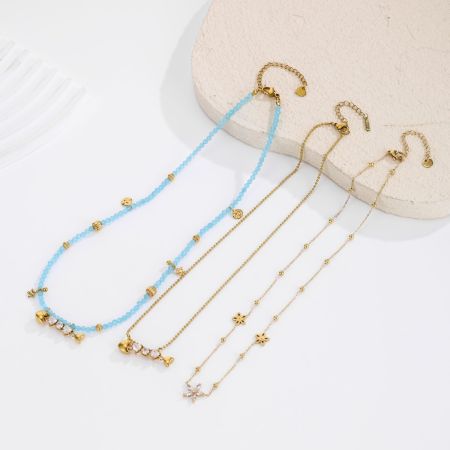 Colliers pendentifs pour femmes en acier inoxydable, couleur or, avec perles de forme irrégulière en forme de poisson et zircon. 2