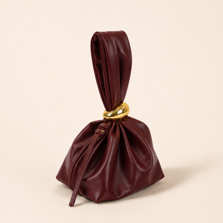 Sacs à main seau pour femmes, style parisien chic, en PU de qualité supérieure, couleur unie, avec détails métalliques et fermeture torsadée.